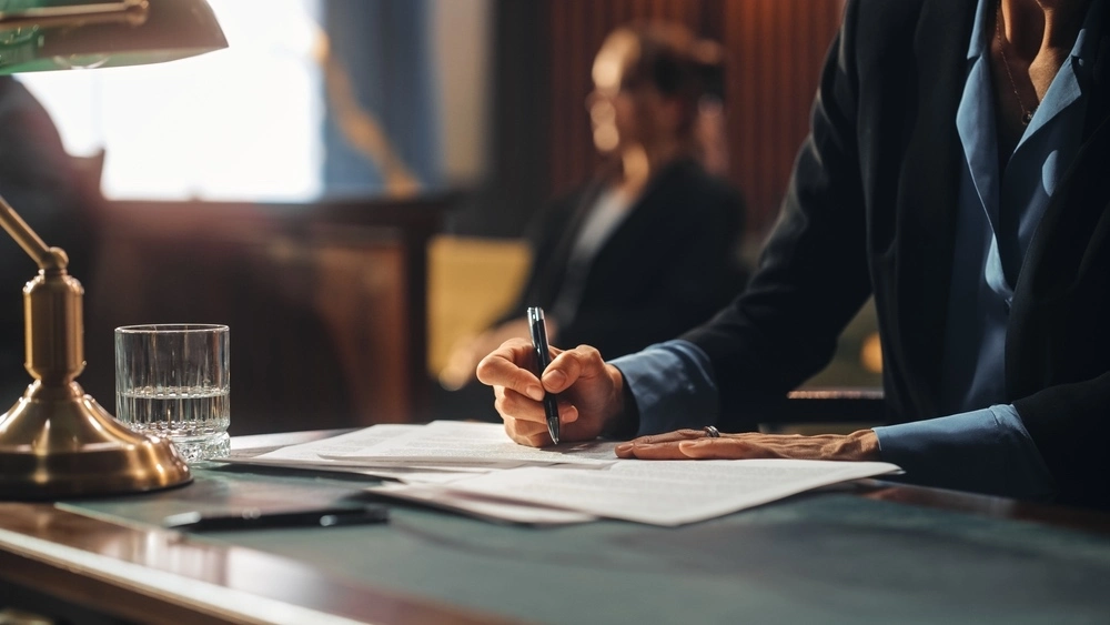 Defendant and attorney in a courtroom