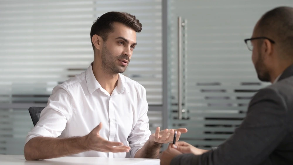 A person actively discusses with a lawyer, representing strategies to address potential penalties for receiving stolen property